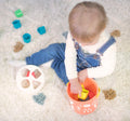 Cubo didático Miniland com peças geométricas coloridas para encaixe