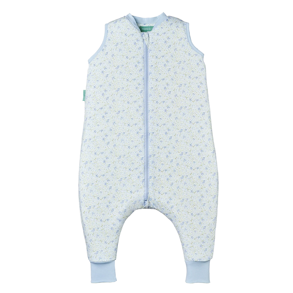 Saco de dormir com pés MolisandCo TOG 1.0, padrão floral "Blue Lily", aberto com fecho central visível.