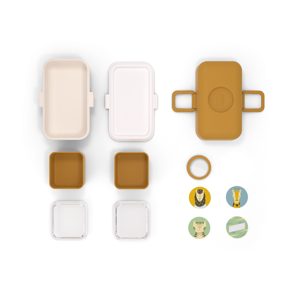 Componentes da lancheira Monbento MB Tresor: recipientes, tampas, juntas e autocolantes personalizáveis com animais e padrões.