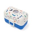 Lancheira Monbento MB Tresor Catimi Blue Terrazo fechada, com padrão colorido de confetes sobre fundo branco e base azul.