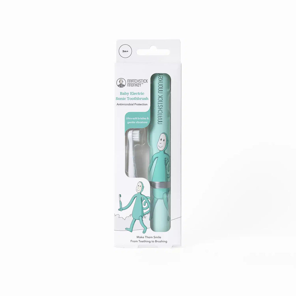 Embalagem da escova de dentes elétrica sónica Matchstick Monkey para bebés, mostrando o design branco e verde-água com um macaco ilustrado e indicação de uso a partir dos 3 meses.