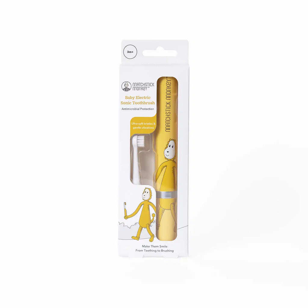 Embalagem da escova de dentes elétrica Matchstick Monkey Leão, amarela, com a escova visível e texto "Baby Electric Sonic Toothbrush" e "3m+".