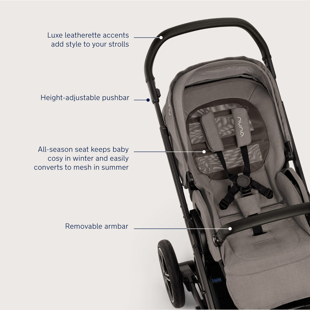 Vista lateral do carrinho Nuna MIXX NEXT com assento reclinado, mostrando a suspensão e as rodas grandes para conforto em qualquer terreno.