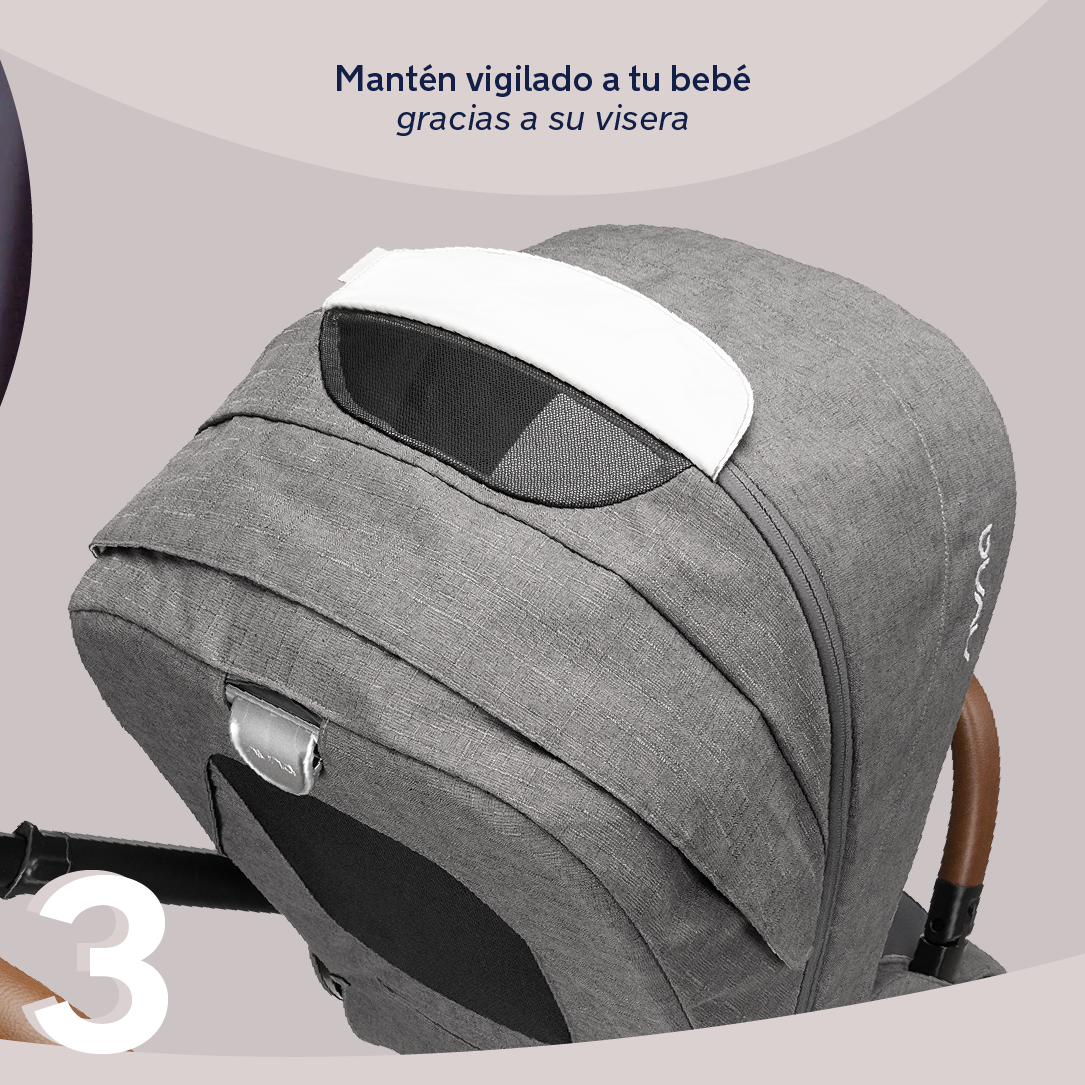 Detalhe da capota extensível do carrinho Nuna MIXX NEXT em tecido cinzento, com viseira e painel de ventilação para manter o bebé vigiado.