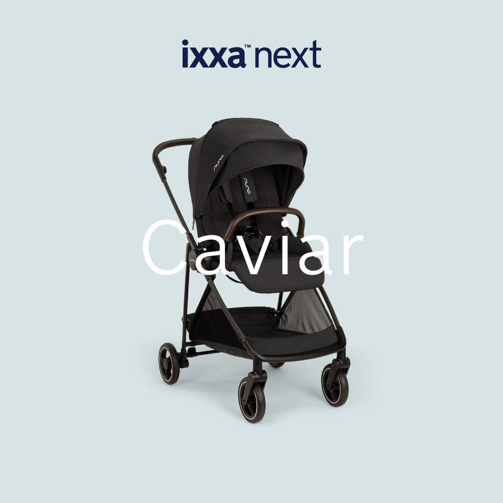 Detalhe do fecho magnético MagneTech Secure Snap™ do arnês do carrinho Nuna IXXA NEXT.