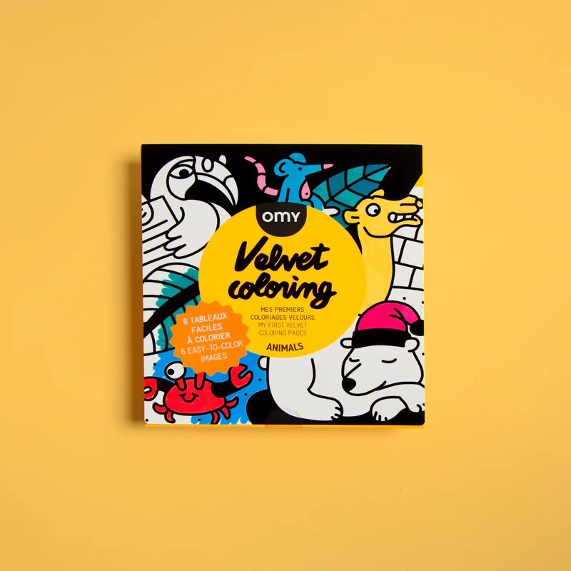 Capa do OMY Livro de pintar em veludo "Animals" com ilustrações em preto e branco de animais variados sobre fundo amarelo.