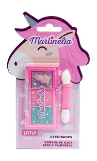 Paleta de sombras Martinelia "Little Unicorn" com tons de roxo, rosa e azul-turquesa, embalada em formato de unicórnio.