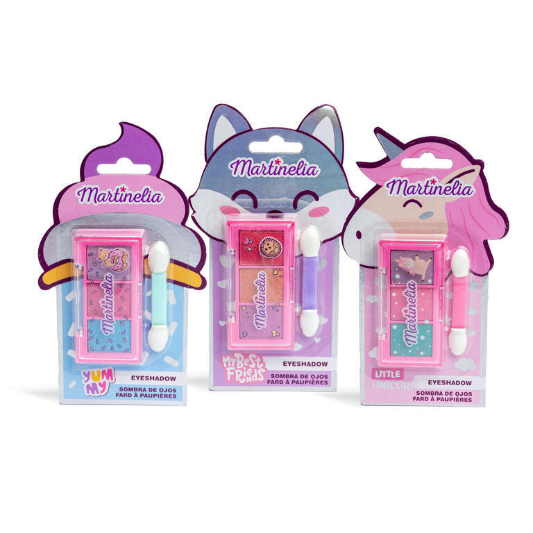 Três embalagens de sombras infantis Martinelia em formato de gelado, raposa e unicórnio, exibindo cores verde, rosa e roxo.