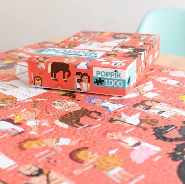 Vista em ângulo da caixa do Puzzle Poppik 1000 peças Mythologie sobre o puzzle parcialmente montado, destacando a temática mitológica.