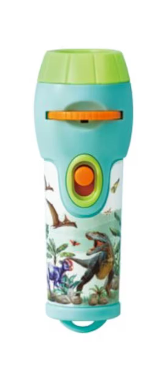 Close-up da lanterna projetora cor-de-água com tema de dinossauros, mostrando o botão de projeção e a ranhura de troca de disco.