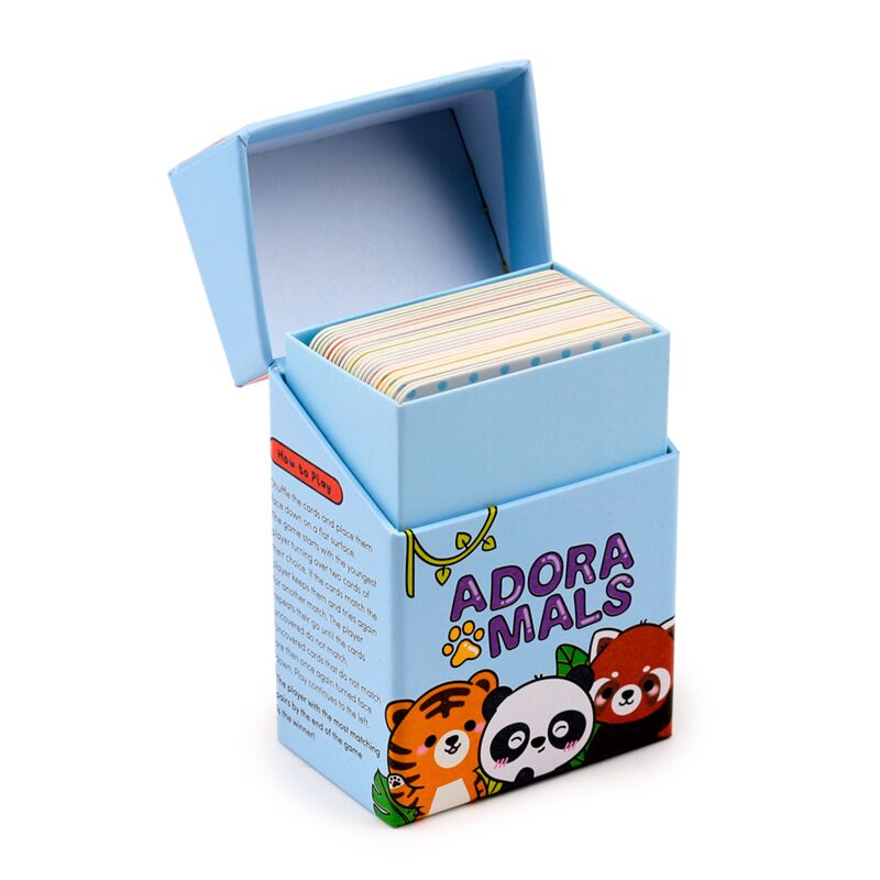 A caixa do jogo de memória Adoramals Selvagem aberta, mostrando as cartas dentro da embalagem.