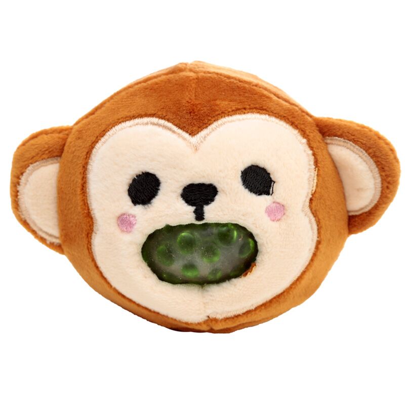 Peluche Puckator Adoramals Queasy Squeezies de macaco castanho com centro espremível de contas verdes visível na boca.