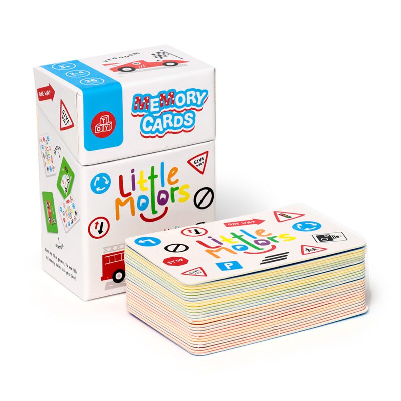 Caixa do jogo Little Motors com pilha de cartas ao lado, mostrando a relação entre a caixa e o conteúdo.