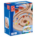 Caixa do Hape Conjunto de 50 Berlindes (Quadrilla Marble Run E6035), mostrando o circuito de madeira com berlindes em movimento e um conjunto de berlindes coloridas. Idade recomendada 4-99 anos, 51 peças.
