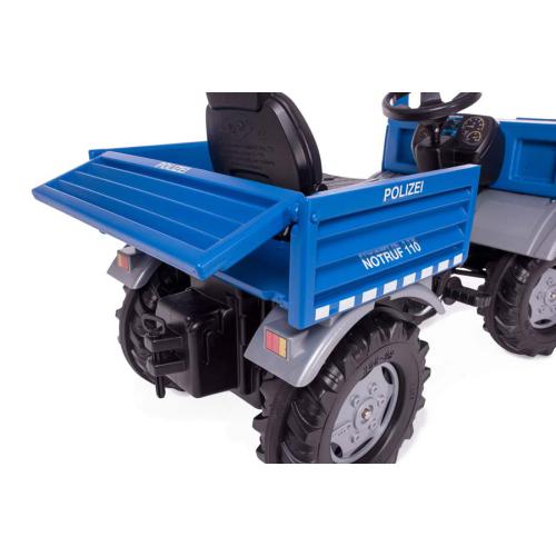 Detalhe da caçamba traseira do RollyToys Unimog Polícia com a porta aberta, mostrando a funcionalidade de basculamento.
