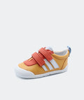 Sapatilha infantil Blanditos Luna cor Coral (laranja/amarelo/branco), vista lateral. Calçado barefoot respeitador com duplo velcro e sola flexível para criança.