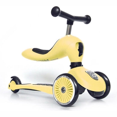 Trotinete 2 em 1 Scoot & Ride Highwaykick 1 amarela, configurada no modo trotinete de 3 rodas, destacando o guiador ajustável.