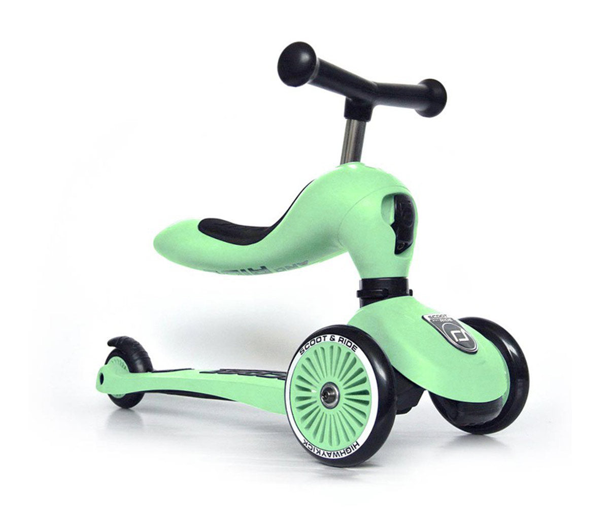 Bicicleta de equilíbrio/trotinete Scoot & Ride Highwaykick 1 na cor verde menta, vista de lado, focada na funcionalidade de assento.