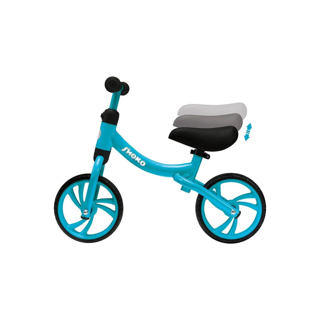 Detalhe da bicicleta de equilíbrio Shoko azul, ilustrando o mecanismo de ajuste de altura do selim (32cm a 42cm) com setas indicativas.