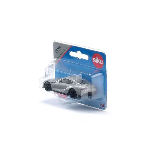 Miniatura SIKU do Toyota GR Supra prateado em embalagem de cartão azul e blister transparente, vista de ângulo superior.