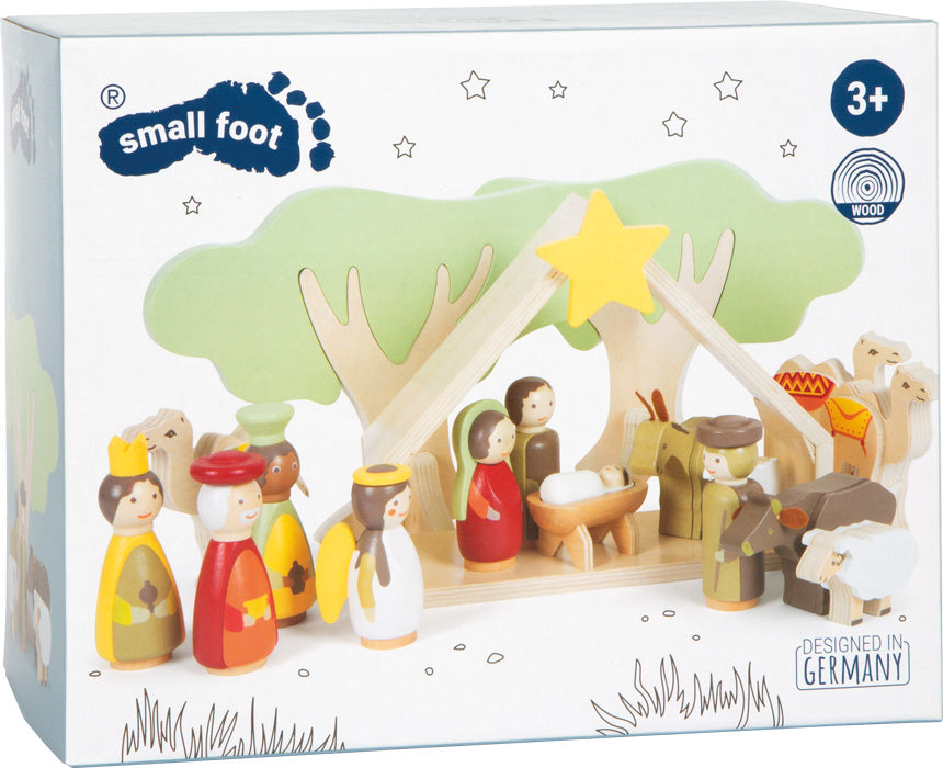 Imagem da embalagem do Conjunto Presépio 3D Small Foot, mostrando todas as figuras de madeira (Sagrada Família, Reis Magos, anjo, animais) montadas no cenário.