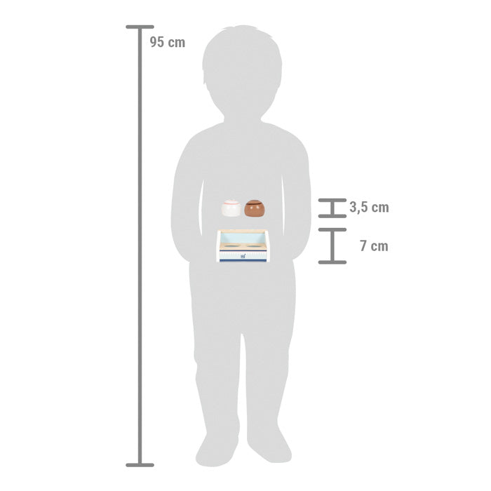 Esquema de escala mostrando o tamanho da gelataria em comparação com a altura de uma criança de 95 cm.