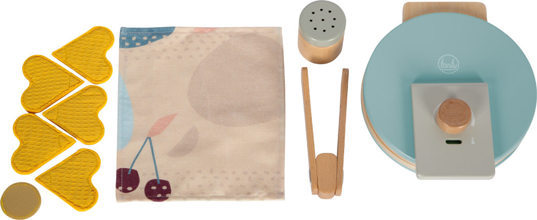 Conjunto completo de brinquedo da máquina de waffles small foot: máquina azul, waffles de tecido, pinça de madeira, guardanapo e dispensador de açúcar.