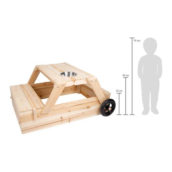Dimensões da caixa de areia 3 em 1 Small Foot, comparando a altura do produto (46 cm) com a de uma criança e indicando a altura do assento (25 cm).