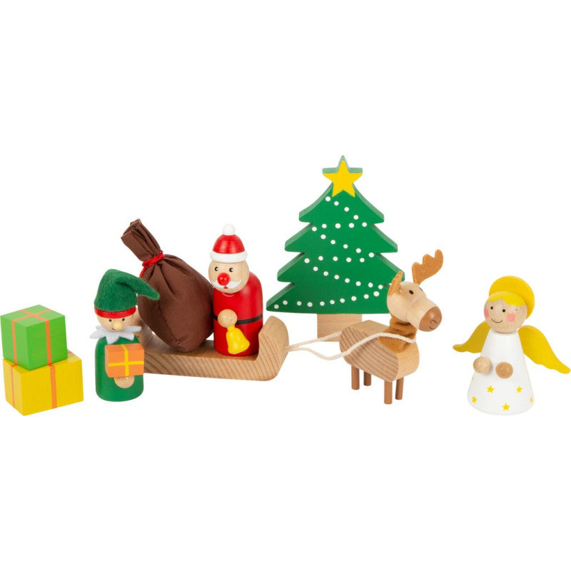 Detalhe do Pai Natal, rena e ajudante em trenó, com presentes, da coleção de figuras de Natal em madeira da Small Foot.