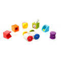 Todas as peças do SmartMax My First Build & Drive separadas, mostrando a variedade de formas e cores.