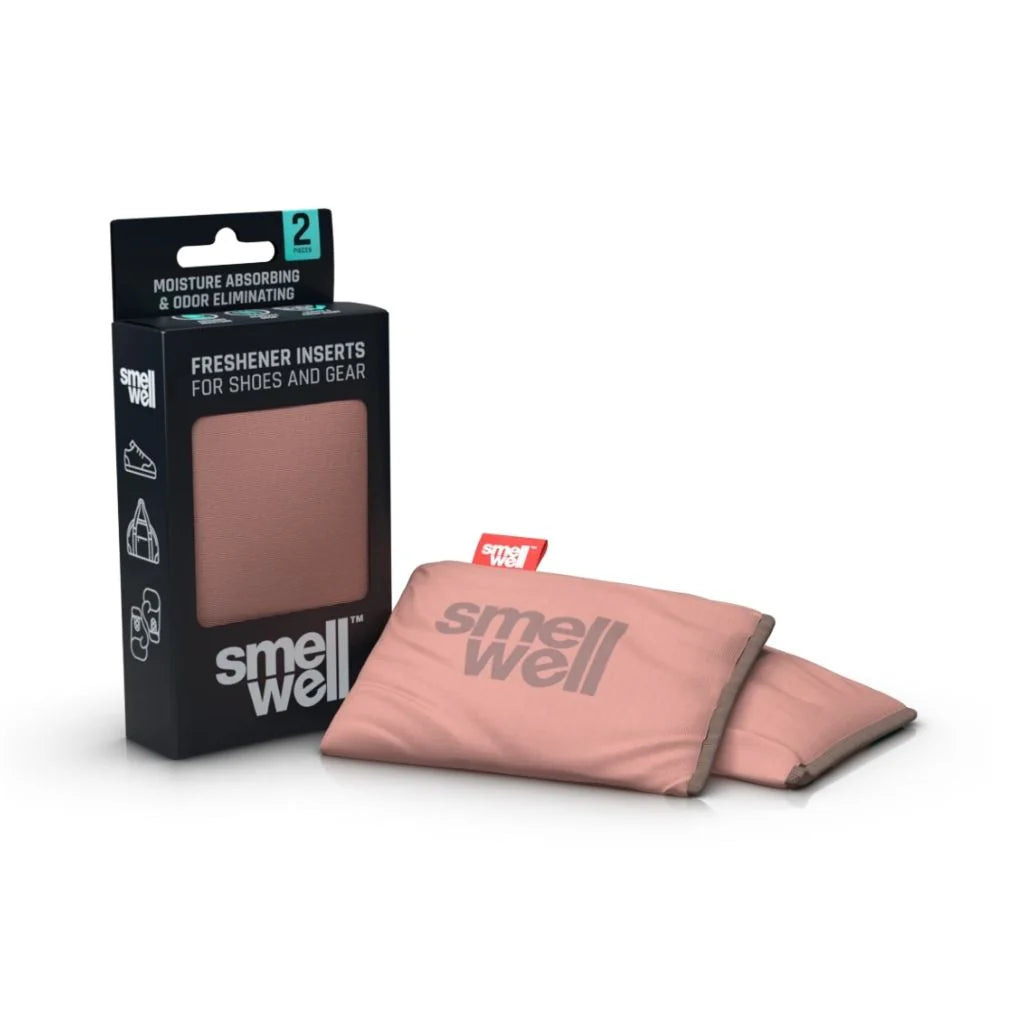 Embalagem e dois sacos SmellWell Active em tom rosa pálido/salmão, ideais para manter o calçado seco e sem odores.