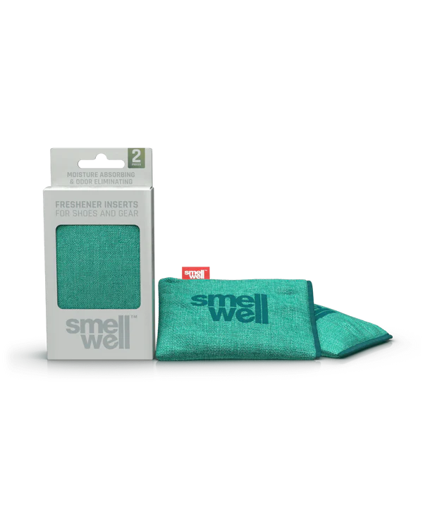 Embalagem e dois sacos SmellWell Active cor verde-água/turquesa, destacando a textura do tecido e a função de absorção de humidade.