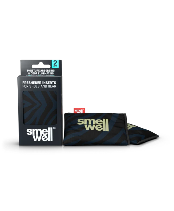 Embalagem e dois sacos SmellWell Active com padrão de riscas escuras (zebra) em preto e azul, para absorção de humidade e odores.