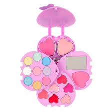 Conjunto de maquilhagem infantil Souza aberto, revelando paletas de sombras, blushes em formato de coração e um espelho, tudo em tons de rosa e lilás.