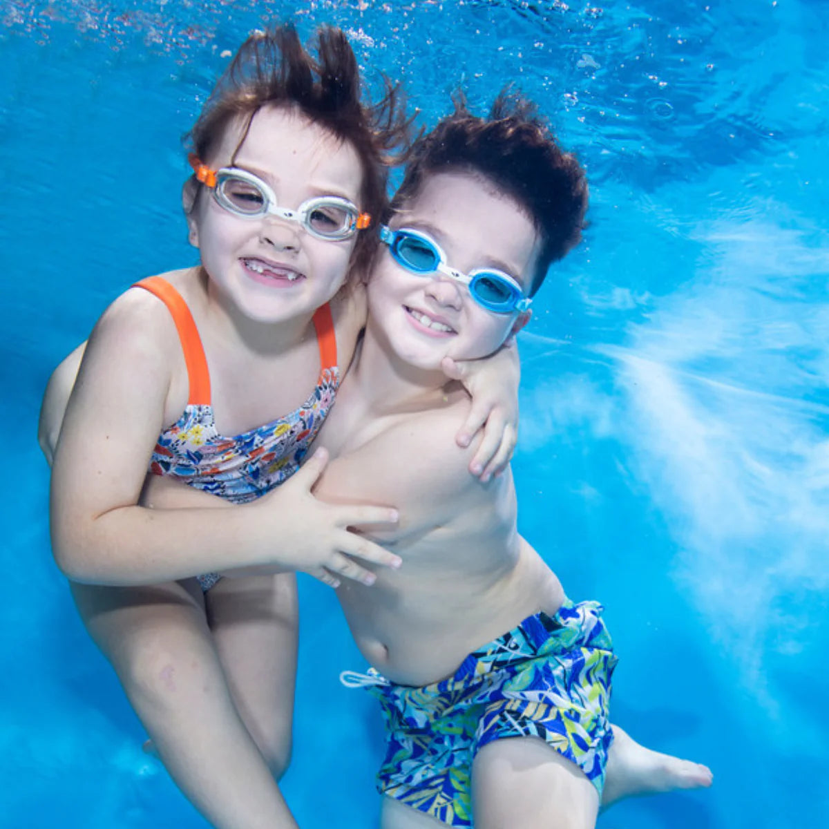 Óculos de natação Splash About Soaked Junior Piranha azuis e verdes, ajustáveis, ideais para crianças de 6 a 14 anos.