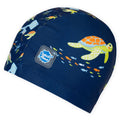 Touca de natação Splash About Turtle Tide para bebé em tons de azul com padrão de tartarugas.