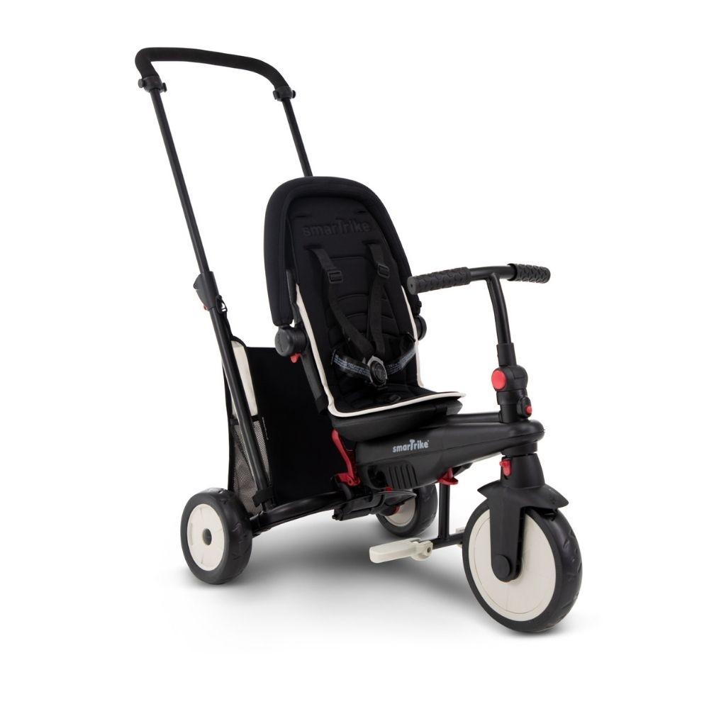 Triciclo evolutivo Smartrike STR3 creme visto de lado com o guiador dos pais