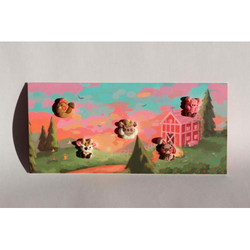 Cinco acessórios "Summies" temáticos de quinta dispostos sobre o cartão ilustrado com celeiro, árvores e céu ao pôr do sol.