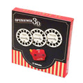 Caixa do brinquedo Svoora Optiviewer 3D, vermelha e preta, mostrando o projetor vermelho e três rolos brancos com os temas Dinossauros, Jungle Story e Space Journey.