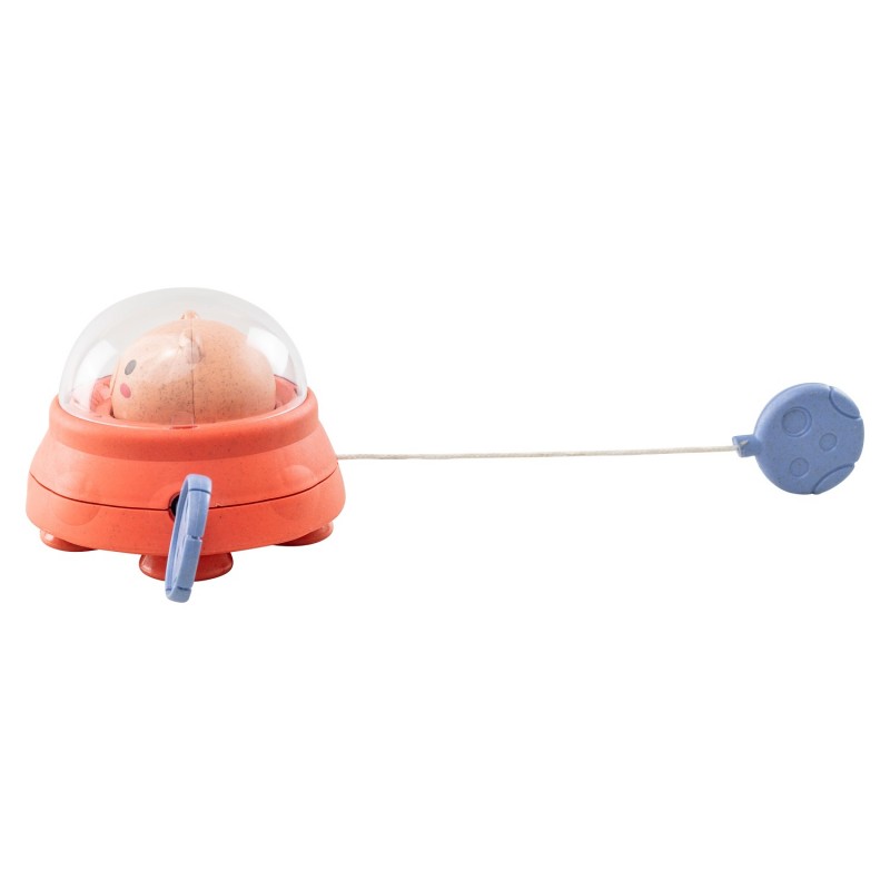 Brinquedo de banho Space Piggy com mecanismo de puxar e soltar (cordão azul com flutuador) sobre fundo branco.