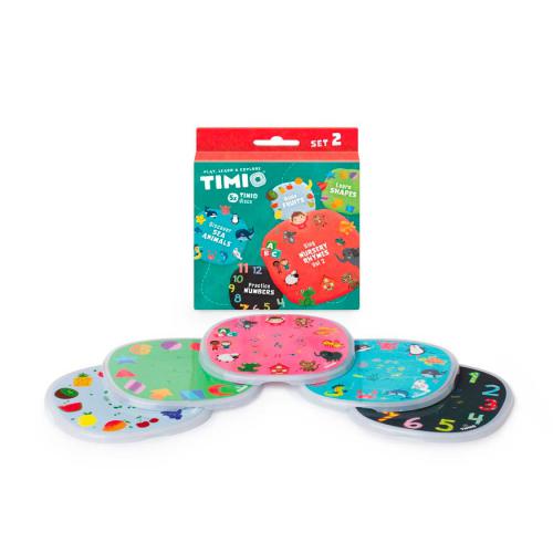 Caixa do Timio Conjunto 2 com os 5 discos visíveis, mostrando a embalagem e o design atrativo para crianças.