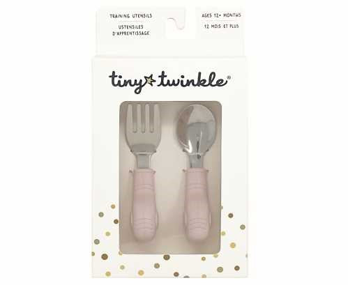 Embalagem branca dos talheres de aprendizagem Tiny Twinkle, exibindo o garfo e a colher com cabos cor-de-rosa de elefante.