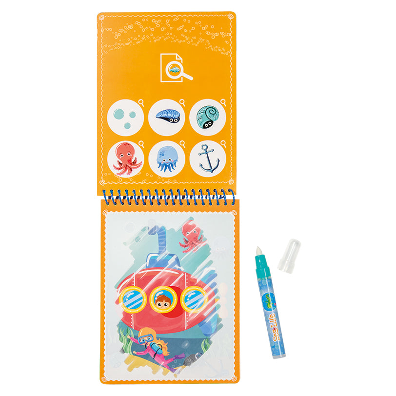 Livro de Colorir Totum Aquamagic Vida Marinha aberto mostrando páginas para colorir e encontrar imagens.