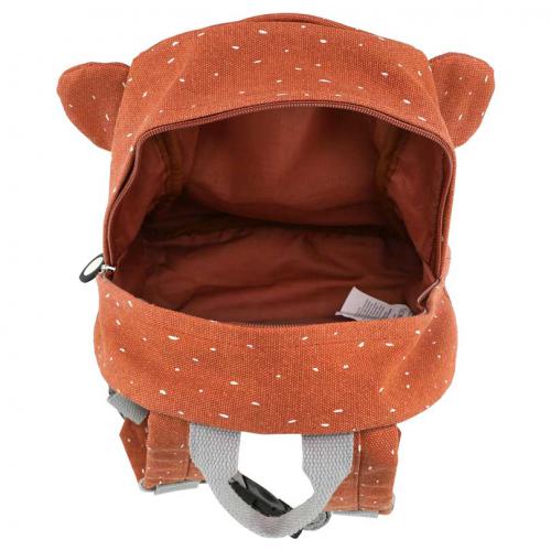 Interior da mochila infantil Trixie macaco aberta, mostrando o compartimento principal forrado e a etiqueta de identificação.
