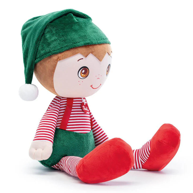 Peluche Trudi Elfo Rudy de perfil, destacando o sorriso travesso, o gorro verde e as pernas listradas.