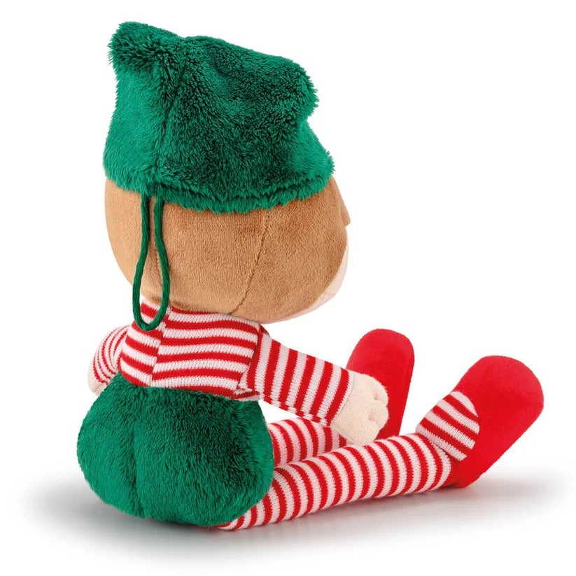 Vista traseira do peluche Trudi Elfo Rudy, mostrando o verso do gorro verde e as pernas às riscas vermelhas e brancas.
