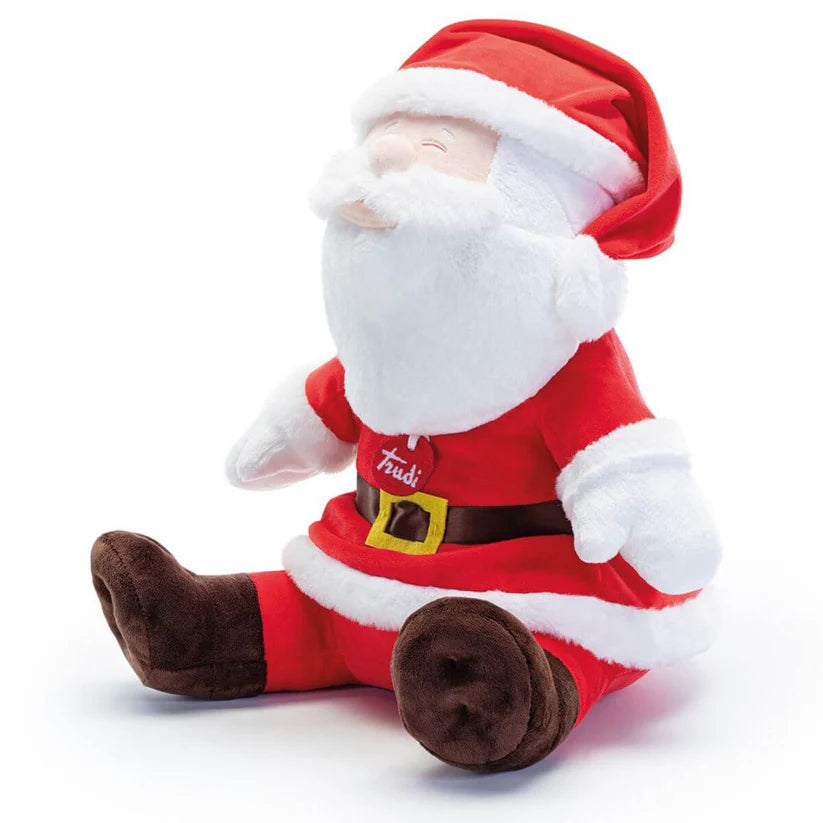 Peluche Trudi XL do Pai Natal sentado, visto de perfil, com barba branca e traje vermelho tradicional, ideal para decoração natalícia.
