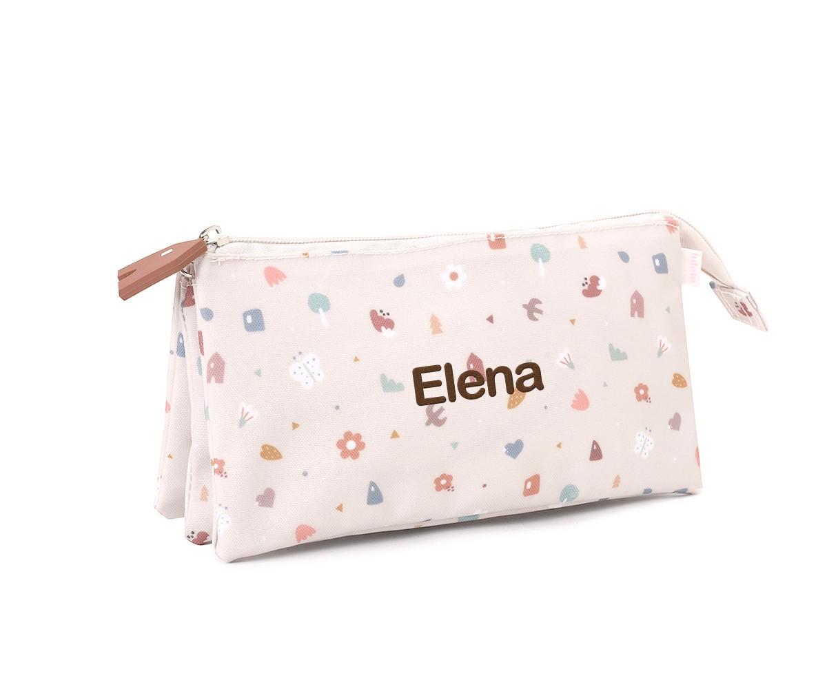 Estojo Tutete de 3 compartimentos em tecido bege claro, estampado com pequenos motivos coloridos e personalizado com o nome "Elena" em castanho.