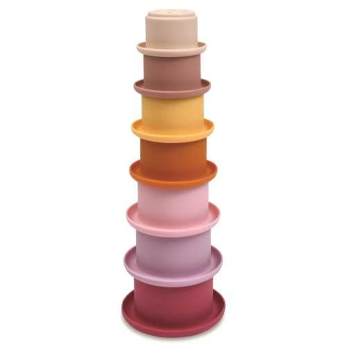 Os 7 vasos de silicone Tiny Twinkle empilhados em forma de torre alta, destacando a sua versatilidade e o tamanho variável.