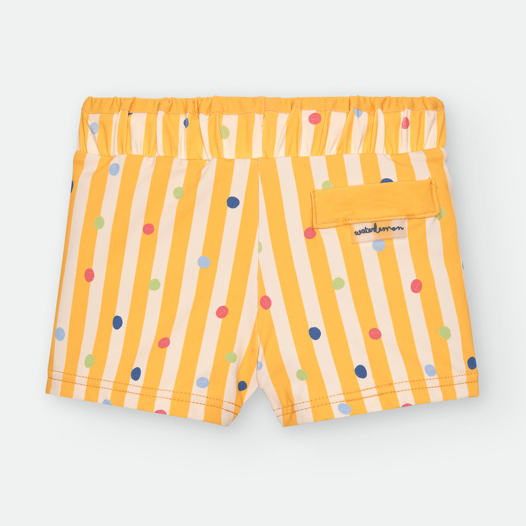 Vista traseira da boxer infantil Waterlemon amarela a riscas e bolinhas, mostrando o cós elástico e um pequeno bolso traseiro com o logótipo da marca.